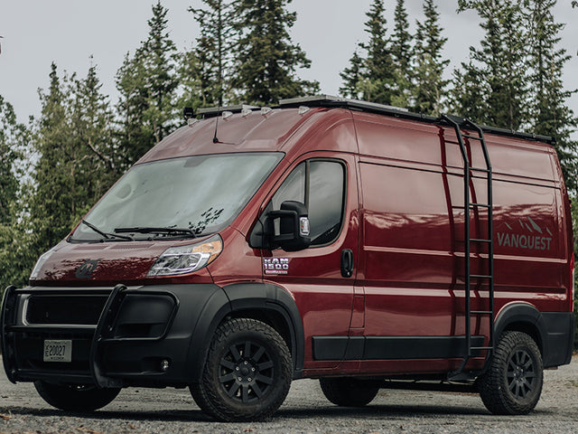 Experience adventure! This rugged maroon Ram ProMaster camper van, with a roof rack & ladder, is a great **RV rental** option.
