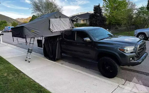 Smittybilt gen 2 xl rooftop tent with dv8 rack