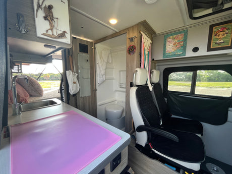 RV rental interior: Left shows kitchen and bed area; middle, a compact bathroom; right, passenger seats and decor.