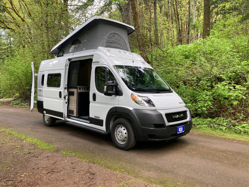  ready for adventure.|A white pop-top camper van — photo 8