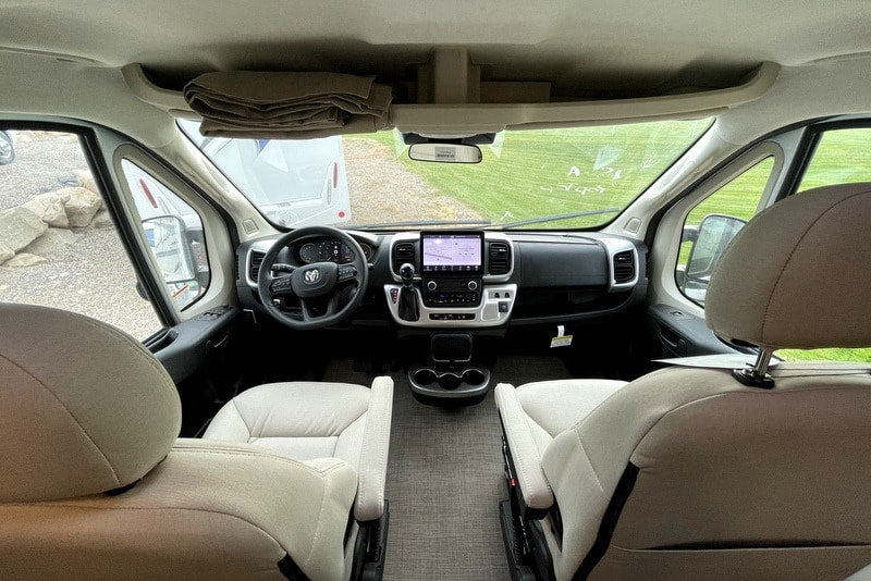 perfect for camping.|Open rear view of a modern RV rental camper van's interior — photo 2
