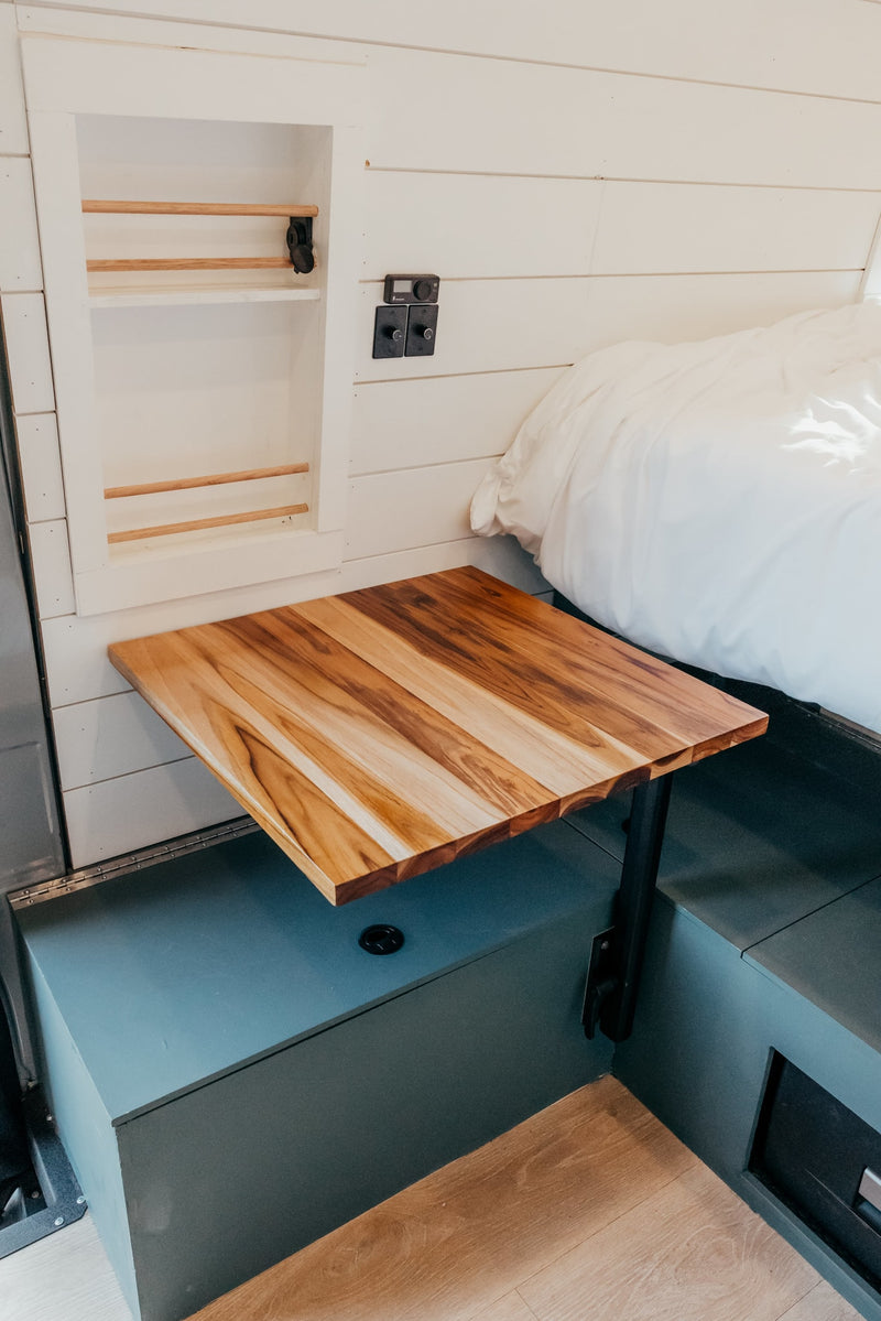  and comfy bed.|RV rental's modern camper interior features shiplap — photo 9