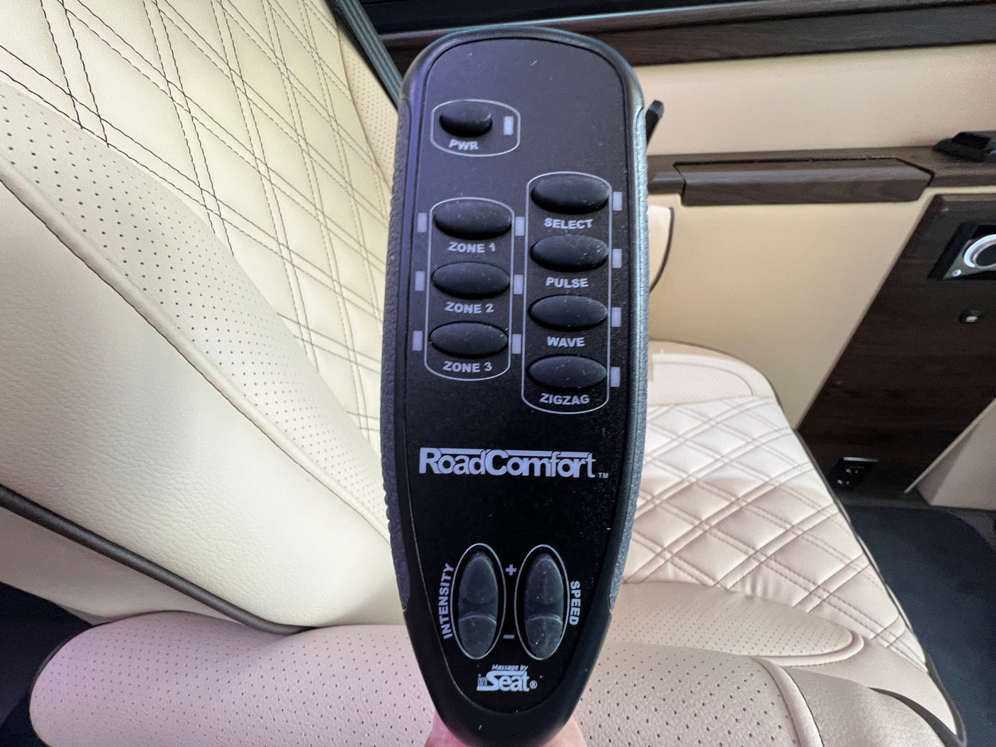 An RV rental's RoadComfort™ remote controls multi-zone seat massage, offering ultimate comfort for journeys. — photo 13