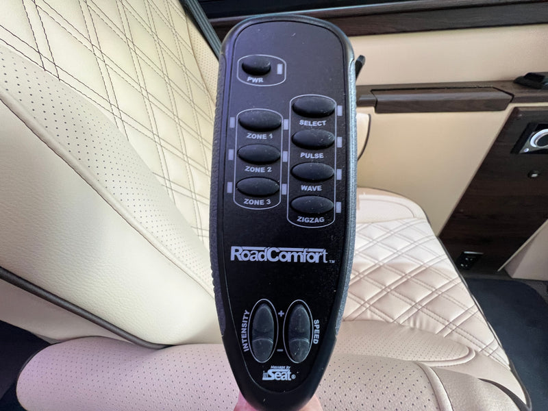 An RV rental's RoadComfort™ remote controls multi-zone seat massage, offering ultimate comfort for journeys. — photo 13