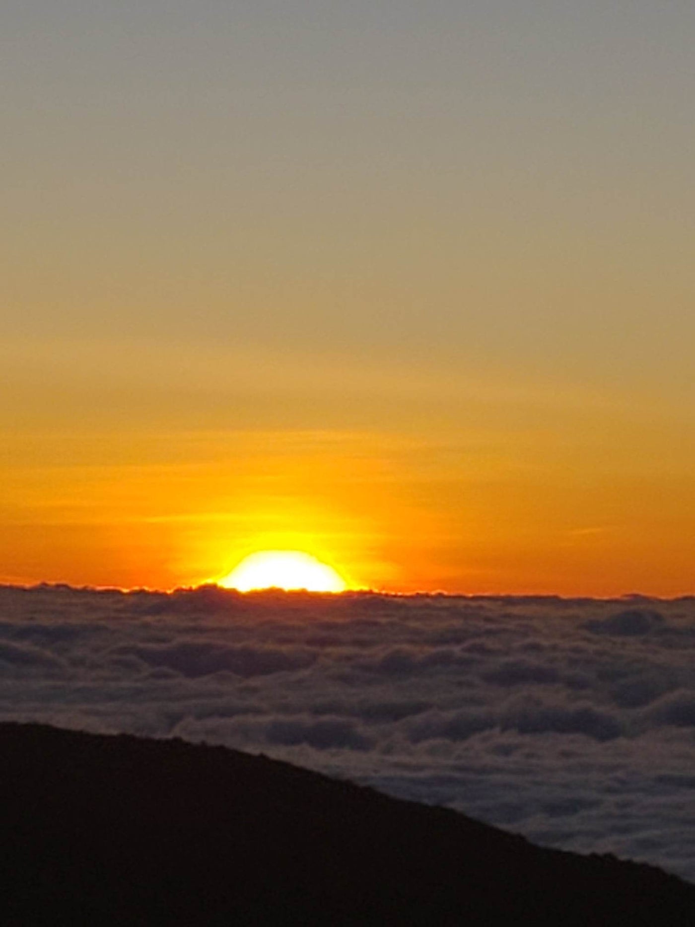  ideal for an RV rental getaway. Lush tropical landscape awaits!|Vibrant orange sunset illuminating clouds from above — photo 1