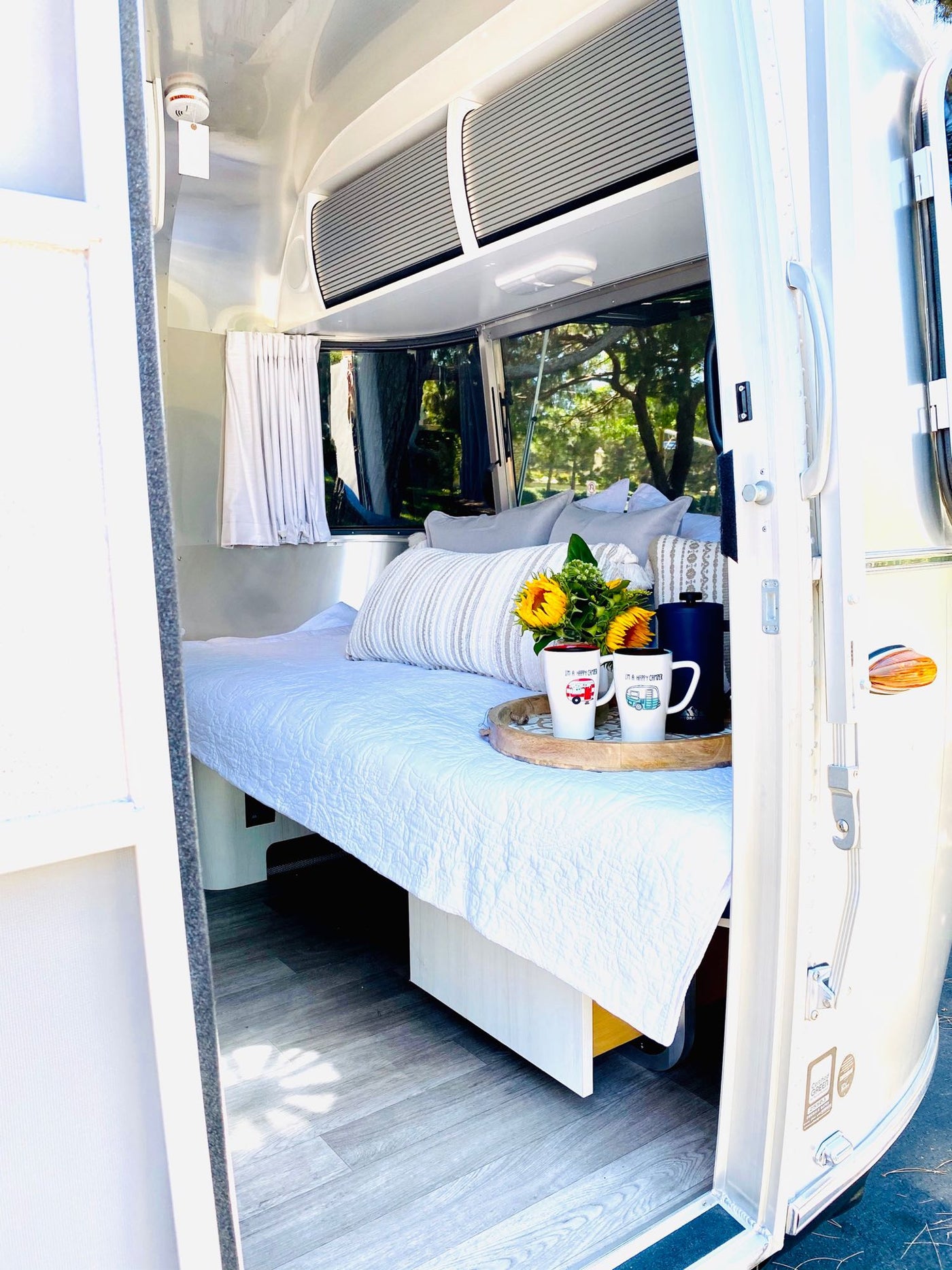  perfect for your next RV rental adventure or camping trip.|Compact RV rental kitchen featuring a sink — photo 19