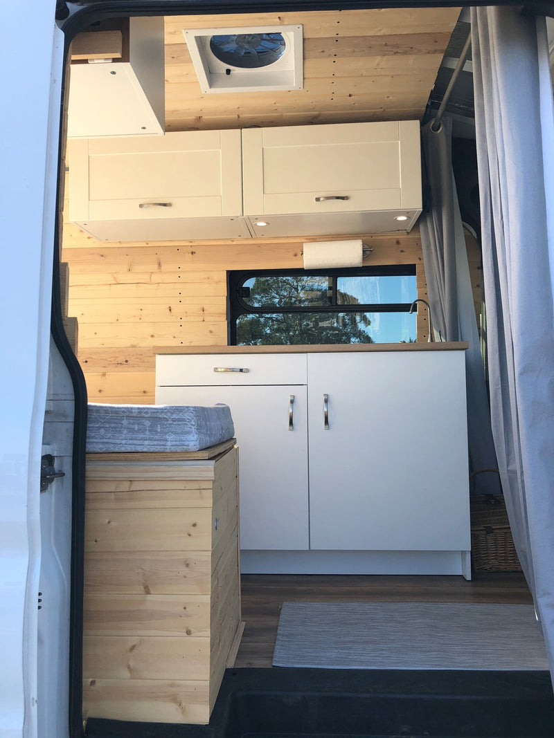  opening to a dazzling ocean view.|Stunning ocean view from this cozy RV rental camper van interior — photo 15