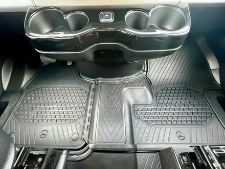 RV rental: Durable Mercedes-Benz floor mats and cup holders. Clean and ready for adventure.