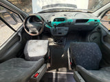 RV rental van interior: dashboard, steering wheel, and patterned front seats. The hood is open, ready for adventure.