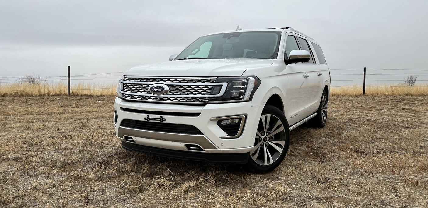 White Ford Expedition SUV, ideal for remote adventures. While not an RV rental, it offers ample space for trips.