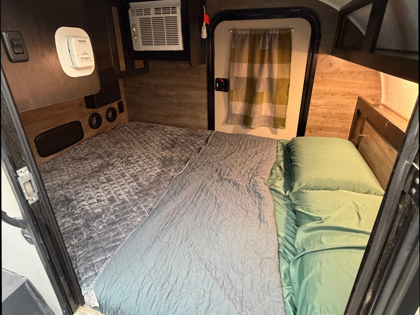  and propane.|Grey Bushwhacker teardrop RV rental parked — photo 4