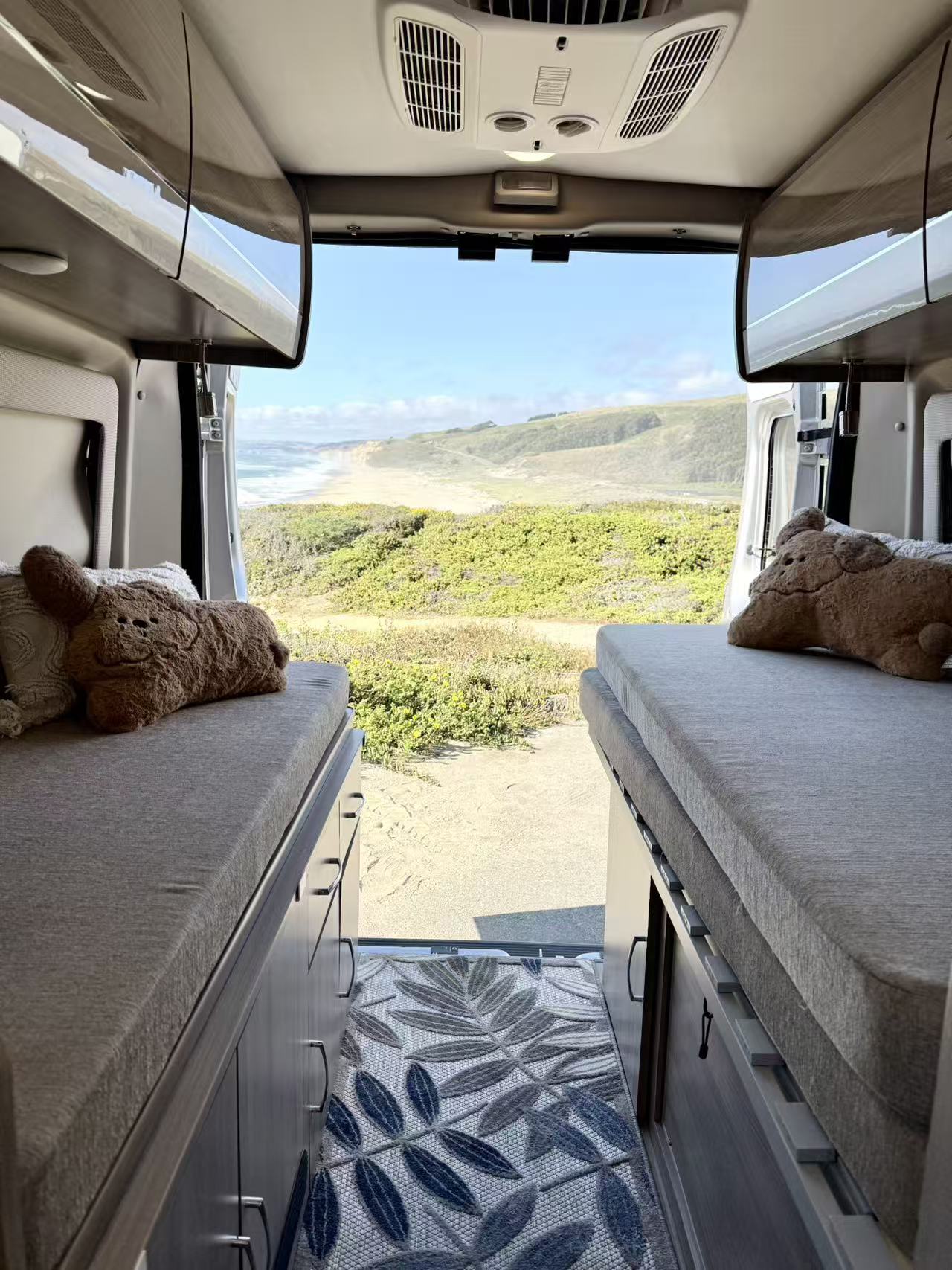  awning.|A white pop-top RV rental camper van — photo 5