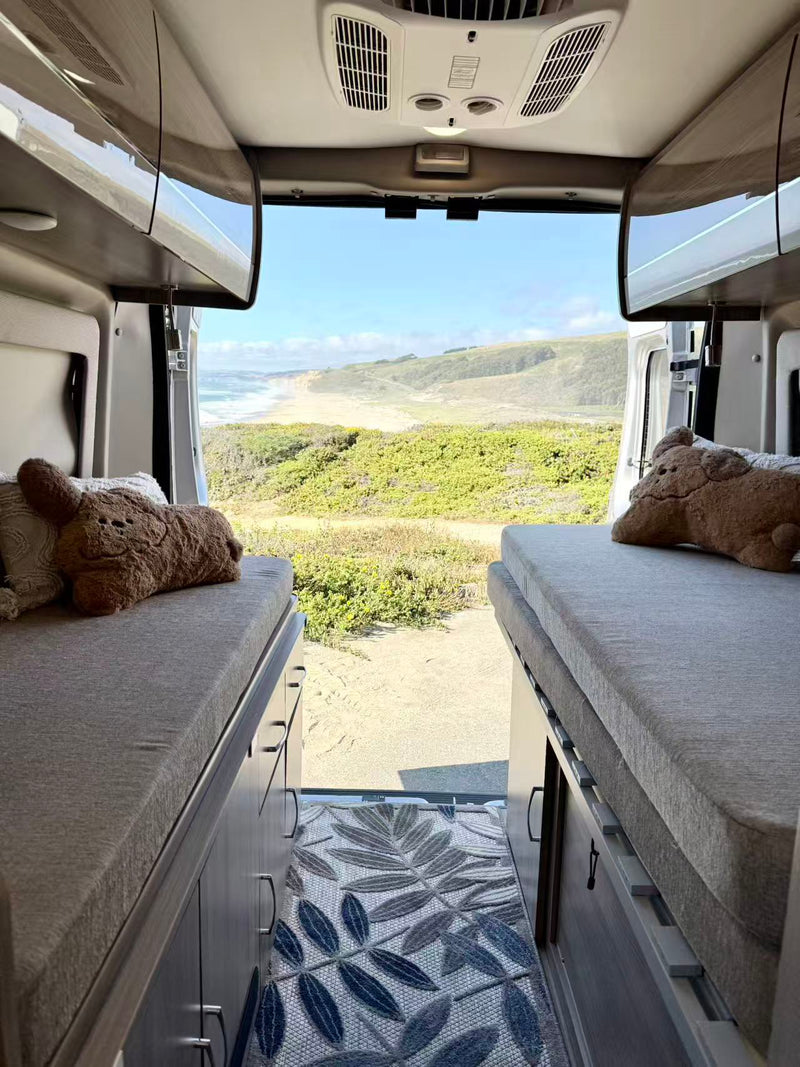  awning.|A white pop-top RV rental camper van — photo 5