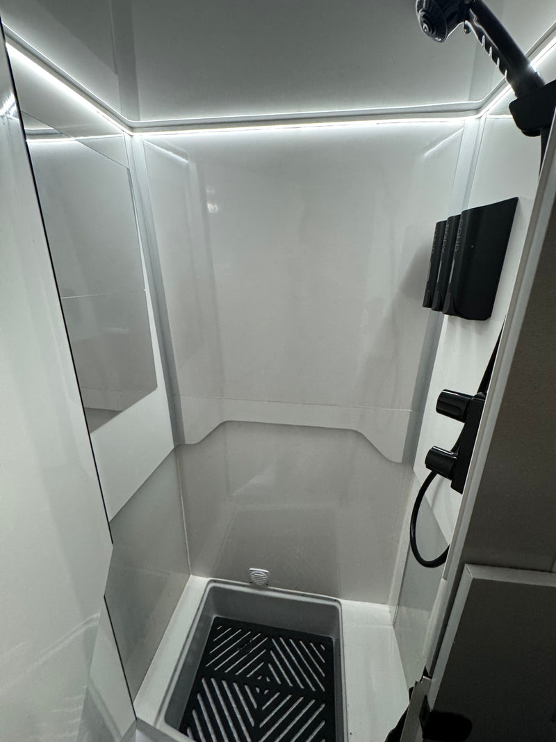  ladder & awning.|Explore this RV rental's camper van interior: compact kitchen — photo 17