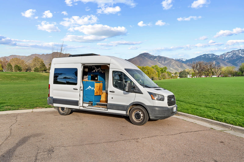 White Ford Transit camper van RV rental — photo 1