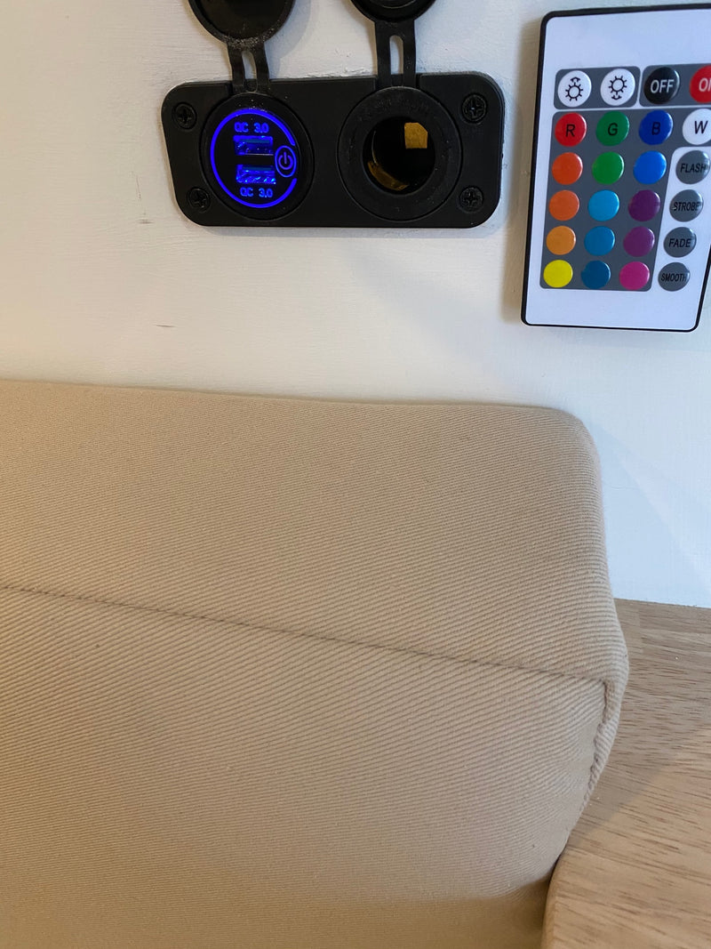 RV rental: Dual QC 3.0 USB charging, 12V socket, and an LED light remote for convenient power and ambiance. — photo 16