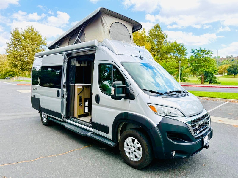 Stylish silver pop-top camper van rv rental — photo 1