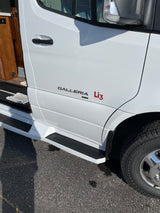 White "GALLERIA Li3" RV rental side view with open door and steps. Ideal for a comfortable road trip.