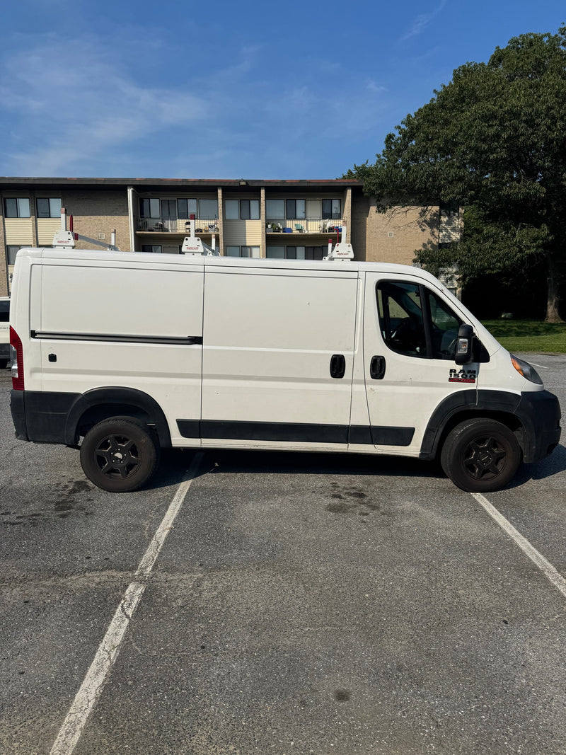  with roof rack and Maryland license plate 4GM6845. Potential for rv rental.|Rear view of a white Ram ProMaster cargo van — photo 3