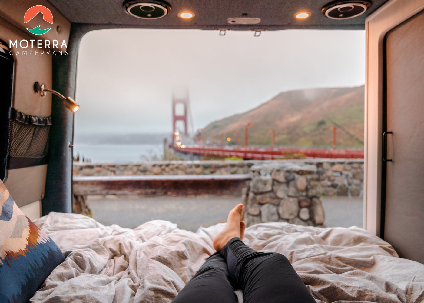  ready for adventure.|Legs stretched out on an RV rental bed — photo 7