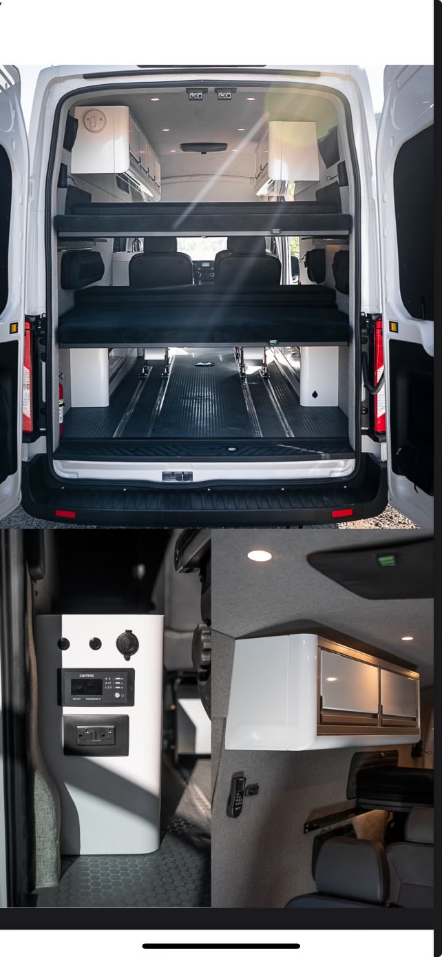  parked on asphalt by a towering rocky mountain and blue sky. Ready for adventure!|RV rental: Camper van interior with raised bed — photo 1