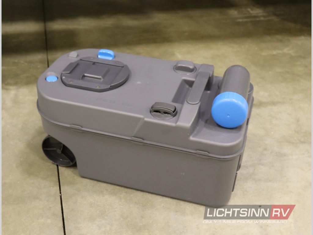 Grey portable RV waste tank with wheels and blue cap, essential for rv rental wastewater disposal.