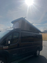 Dark Ram ProMaster camper van with extended pop-top, ideal for your next rv rental adventure.