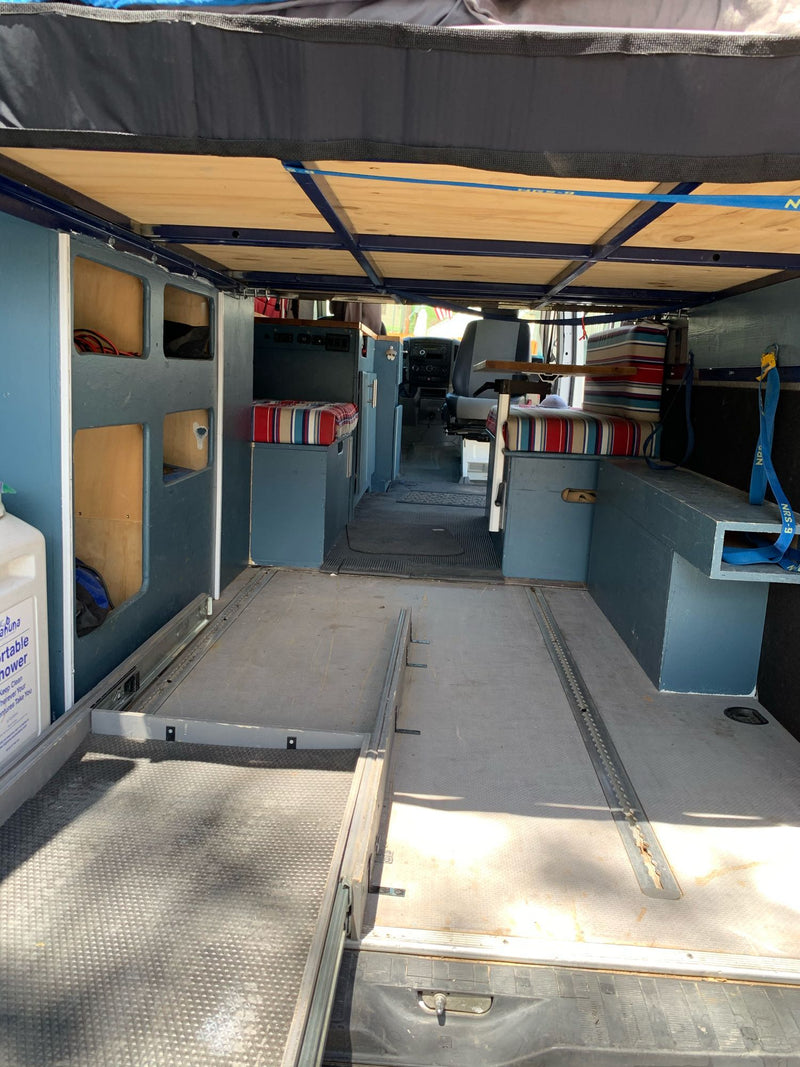  and striped bench seating for your adventures.|White Dodge Sprinter van — photo 10