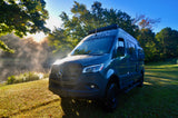 Misty morning greets this Mercedes Sprinter camper van, perfect for your next rv rental adventure by the water.