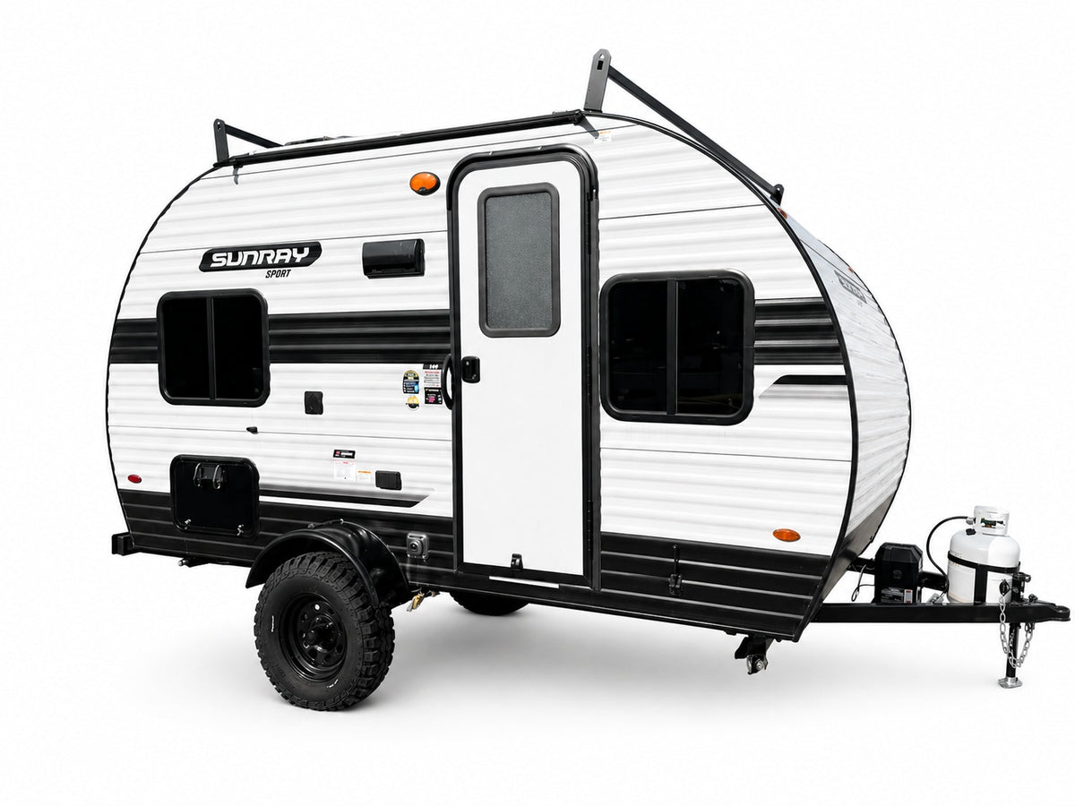 This Sunray Sport teardrop camper is an ideal RV rental for rugged outdoor adventures. White & black, with off-road tires.