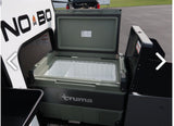 Explore RV rental comforts: A Truma portable fridge/freezer with an open lid, perfect for outdoor kitchen adventures.
