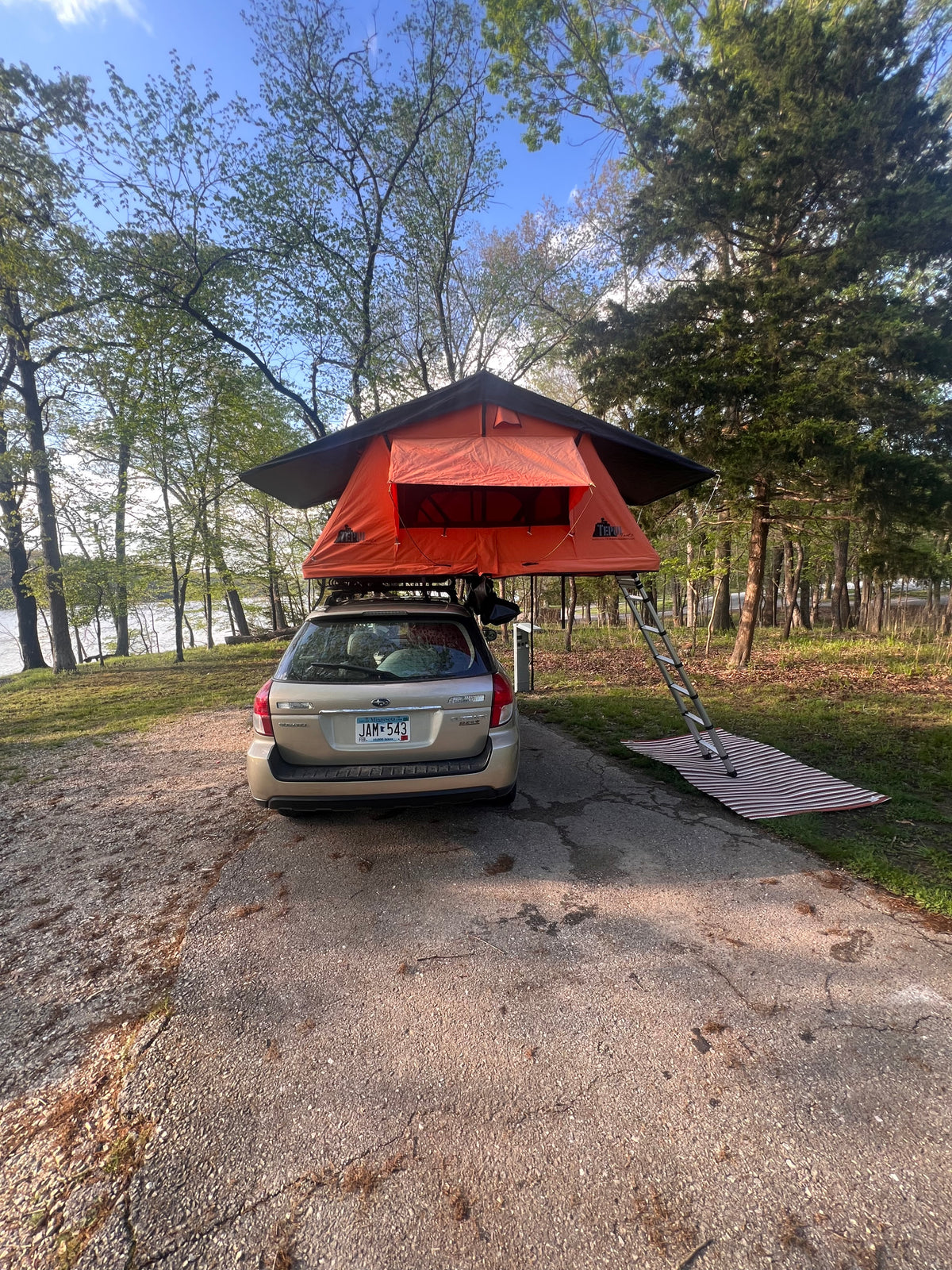 Rooftop tent camping with a Subaru Outback by the water, a compact option instead of an RV rental for outdoor adventure. — photo 2