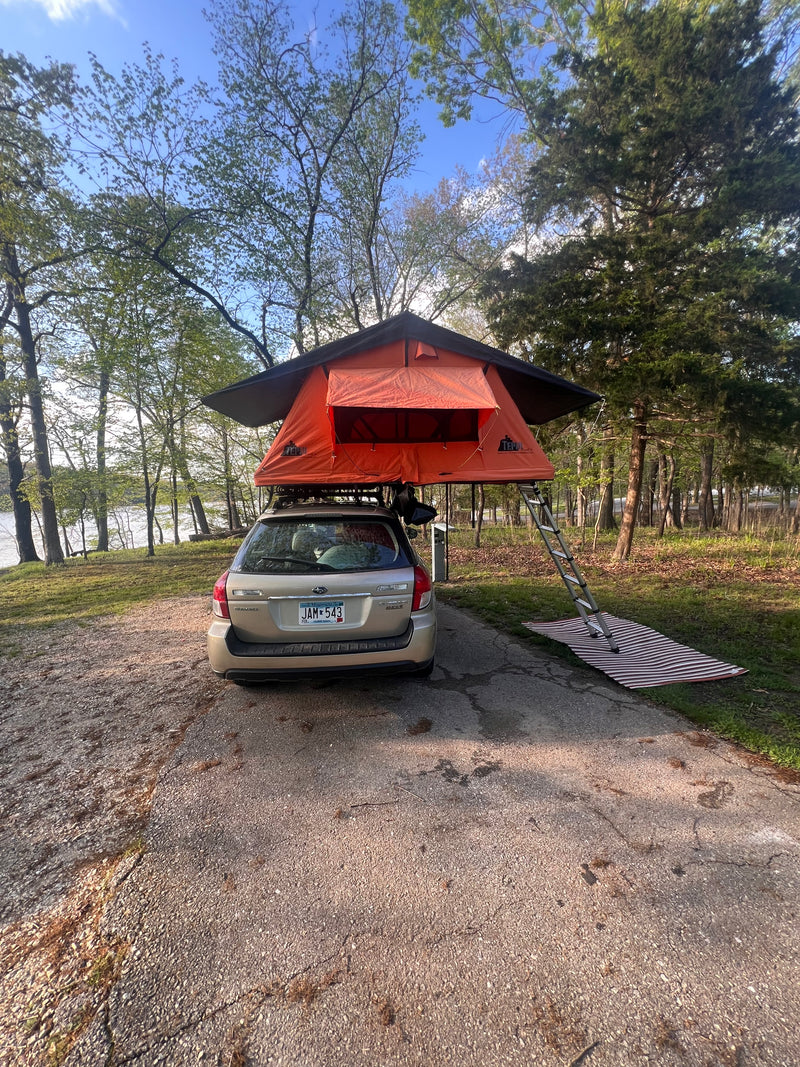 Rooftop tent camping with a Subaru Outback by the water, a compact option instead of an RV rental for outdoor adventure. — photo 2