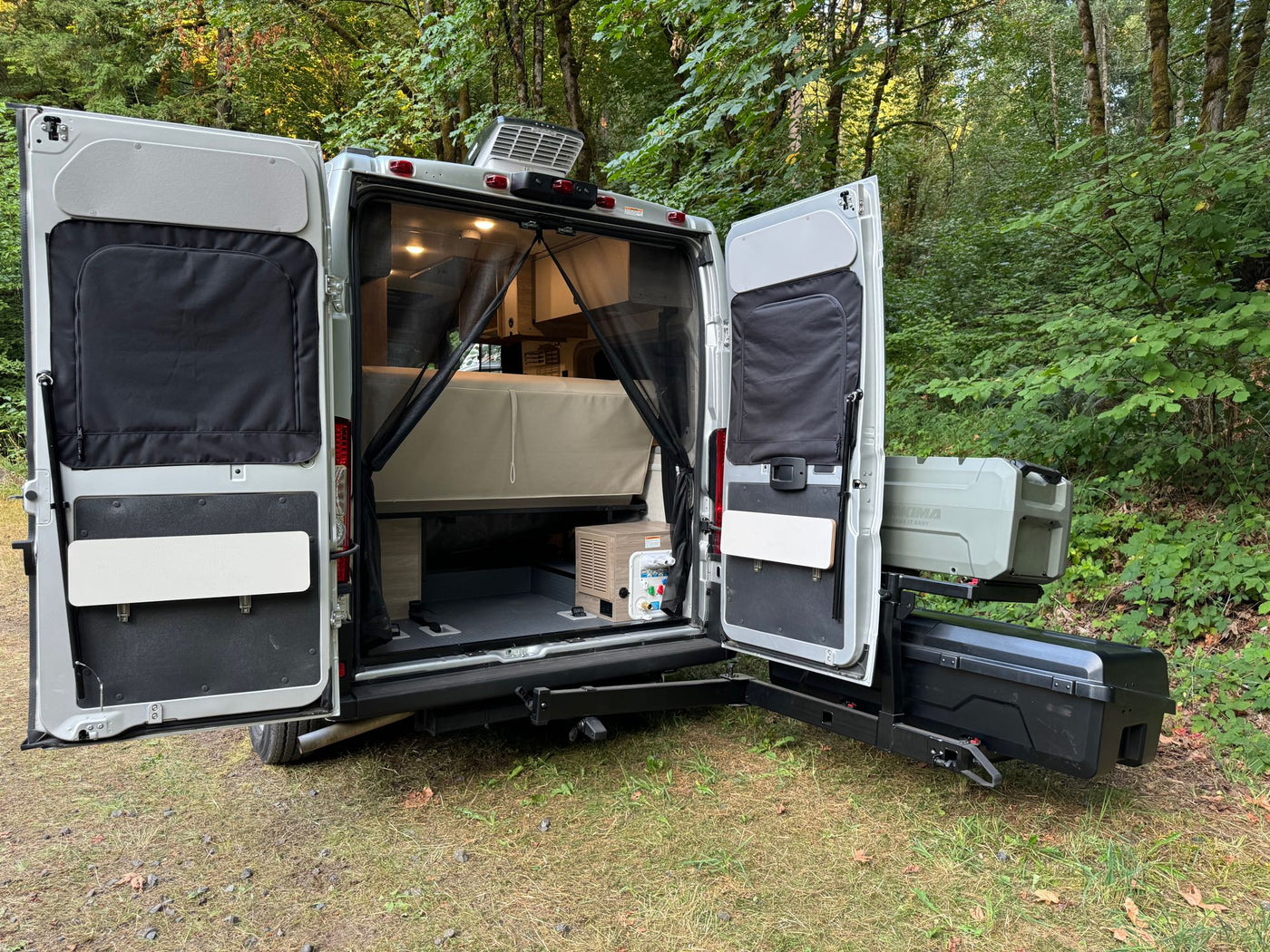  and utility switches.|This cozy camper van interior is perfect for your next RV rental adventure — photo 4