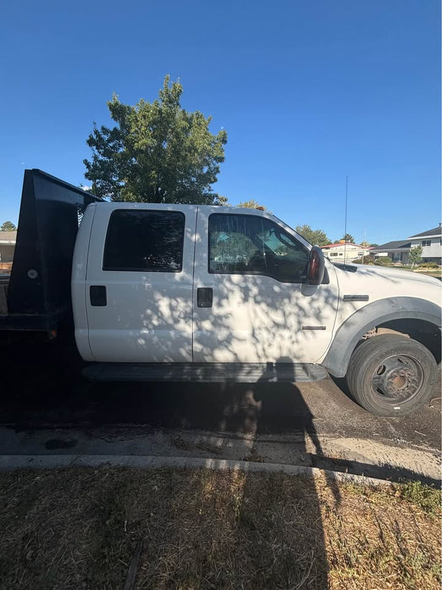 Ford F-450 Flatbed Diesel Truck — photo 3