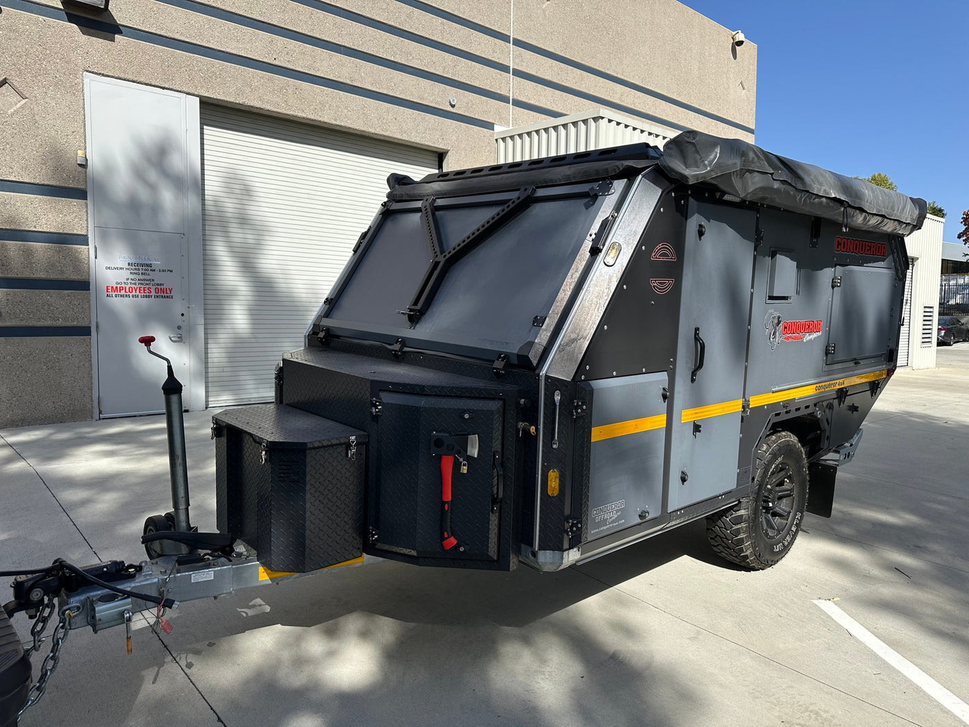 A rugged Conqueror off-road camper trailer, perfect for your next RV rental adventure. — photo 9