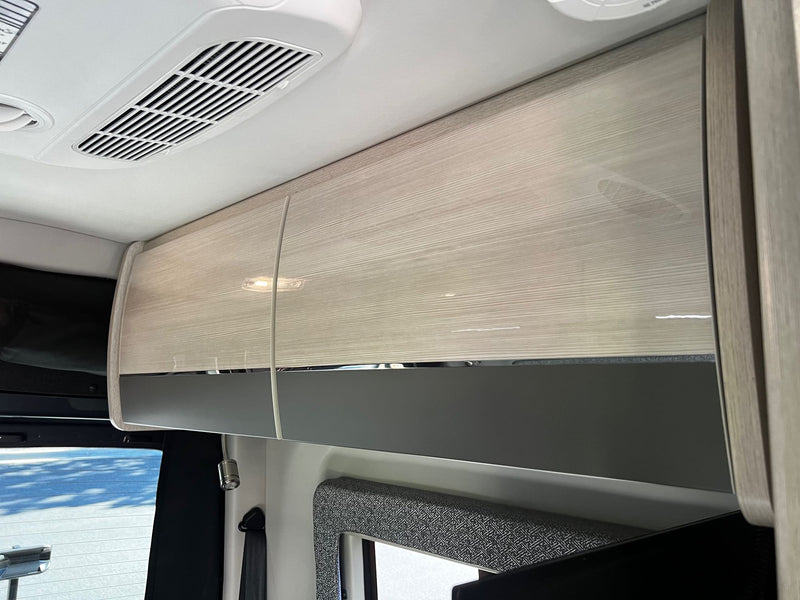  seen from door.|Inside a modern Mercedes-Benz RV rental: cockpit — photo 13