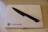Snow Peak knife and board, ideal camping kitchen gear for your RV rental adventures.