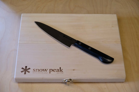 Snow Peak knife and board, ideal camping kitchen gear for your RV rental adventures.