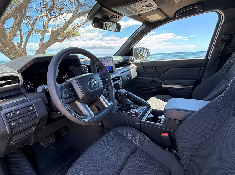  ideal for your next RV rental.|Spacious Toyota SUV interior overlooking a beautiful beach & tree. Ideal for your next rv rental adventure.|Rear vehicle interior with ocean view — photo 6