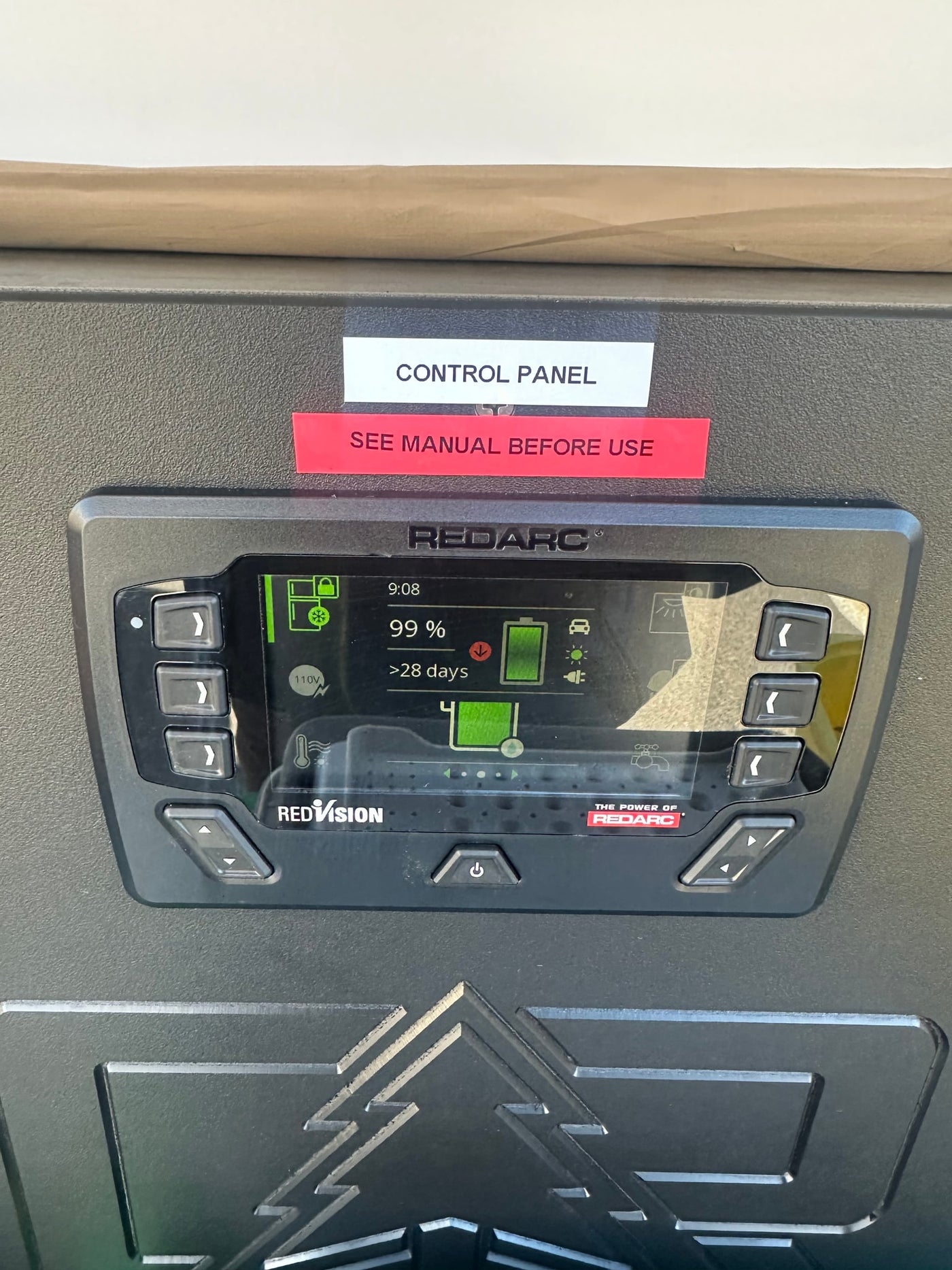 This RV rental's Redarc control panel shows battery power at 99%, with >28 days remaining for off-grid adventures. — photo 15