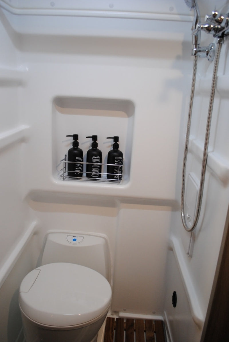  and a bed.|An RV rental kitchen drawer — photo 17