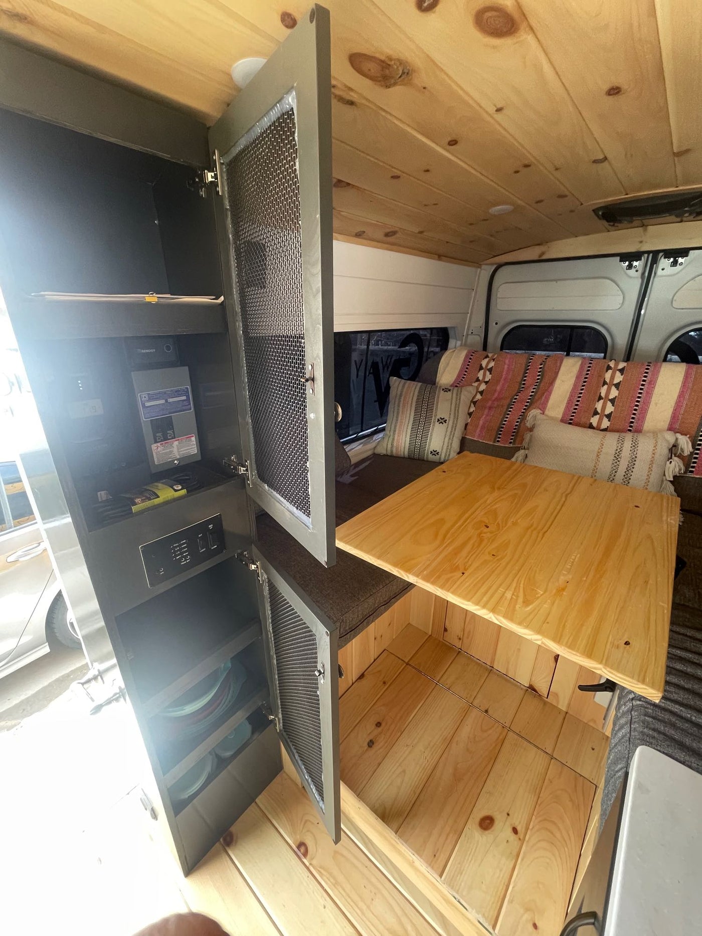  and comfy sofa seating.|Inside a stylish RV rental — photo 10