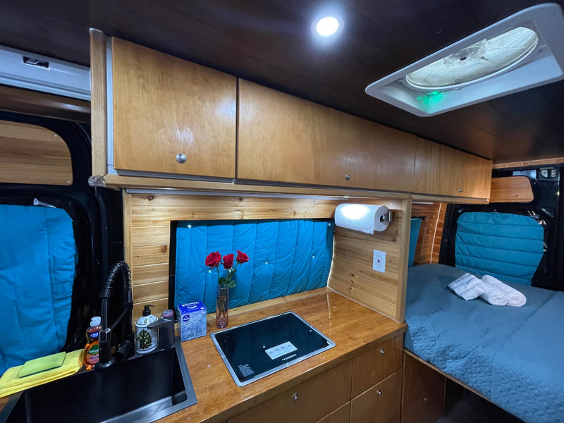  and fresh towels. Ready for adventure!|Spacious RV rental interior featuring a quilted bed with towels — photo 6