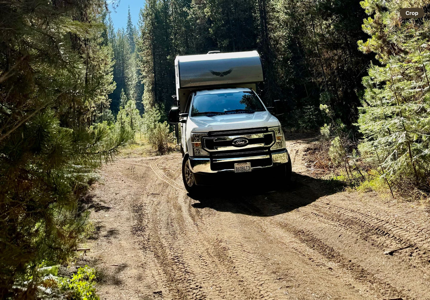  ready for your RV rental journey.|Two truck campers: A Tacoma with pop-top & a Ford with hardside — photo 10