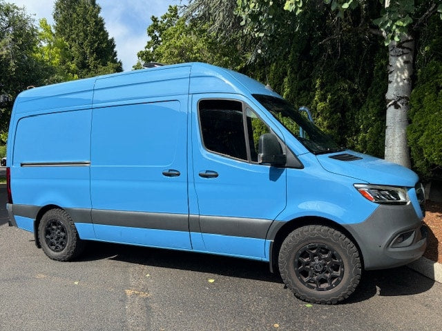  and Anker power for mobile living.|RV rental interior: a fully equipped camper van with bed — photo 3