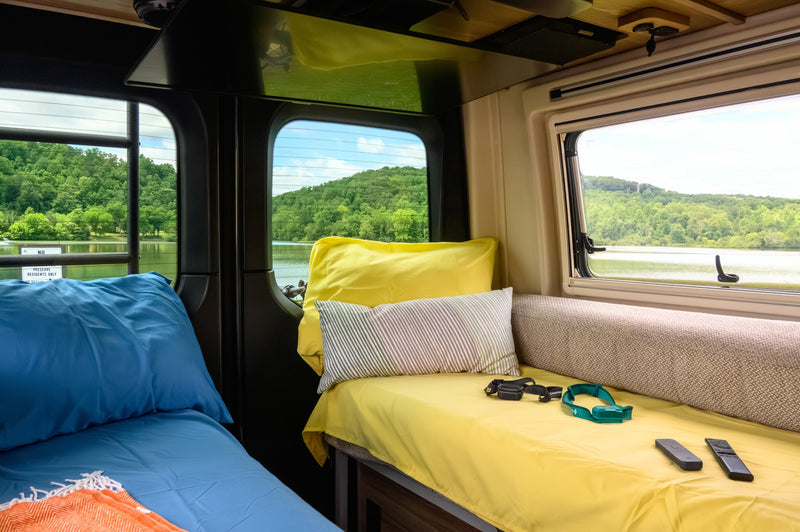  and organized kitchen essentials.|Relax in this rv rental's cozy bedroom featuring a TV with YouTube — photo 15