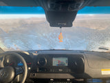 Frosty RV rental view: dashboard, navigation to Gallup, and Moon travel guides for a winter desert adventure.