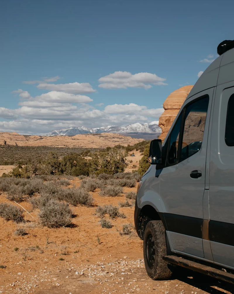  perfect for off-road travel.|A grey Winnebago Revel 4x4 Mercedes Sprinter van — photo 2