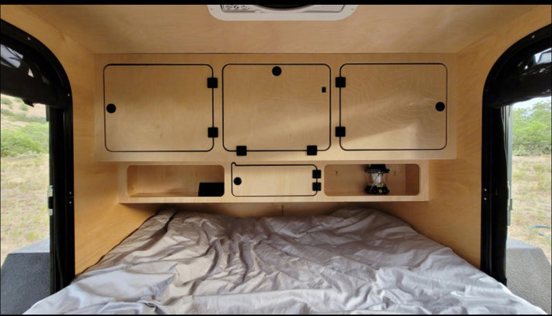  a compact stainless steel two-burner gas stove features black control knobs for cooking ease.|RV rental kitchen: A drawer brimming with organized utensils — photo 30
